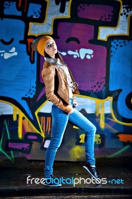 Pretty Young Girl And Graffiti Stock Photo