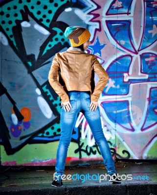 Pretty Young Girl And Graffiti Stock Photo