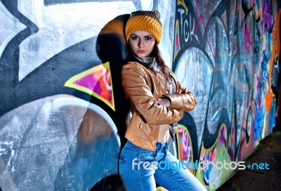 Pretty Young Girl And Graffiti Stock Photo