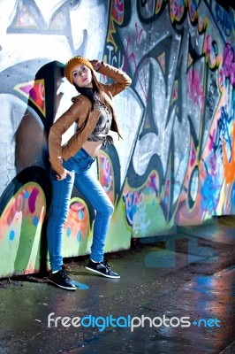 Pretty Young Girl And Graffiti Stock Photo