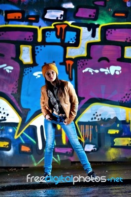 Pretty Young Girl And Graffiti Stock Photo