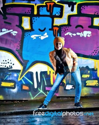 Pretty Young Girl And Graffiti Stock Photo