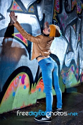 Pretty Young Girl And Graffiti Stock Photo