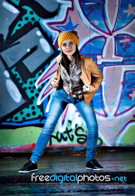 Pretty Young Girl And Graffiti Stock Photo