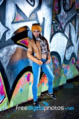 Pretty Young Girl And Graffiti Stock Photo