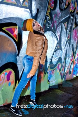 Pretty Young Girl And Graffiti Stock Photo