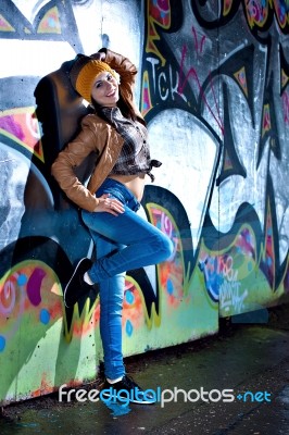 Pretty Young Girl And Graffiti Stock Photo