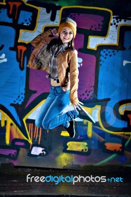 Pretty Young Girl And Graffiti Stock Photo