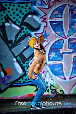 Pretty Young Girl And Graffiti Stock Photo