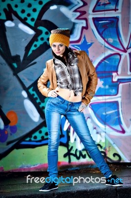 Pretty Young Girl And Graffiti Stock Photo