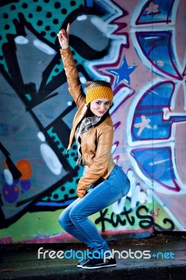 Pretty Young Girl And Graffiti Stock Photo