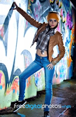 Pretty Young Girl And Graffiti Stock Photo