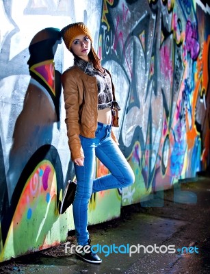 Pretty Young Girl And Graffiti Stock Photo