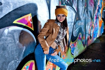 Pretty Young Girl And Graffiti Stock Photo