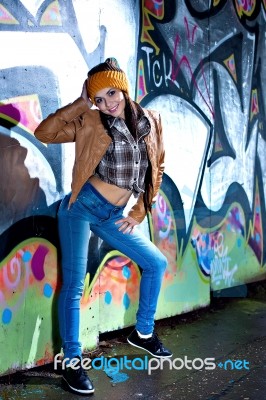 Pretty Young Girl And Graffiti Stock Photo