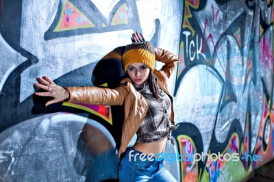 Pretty Young Girl And Graffiti Stock Photo