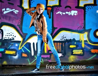 Pretty Young Girl And Graffiti Stock Photo