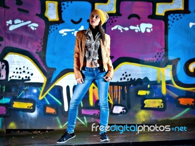 Pretty Young Girl And Graffiti Stock Photo