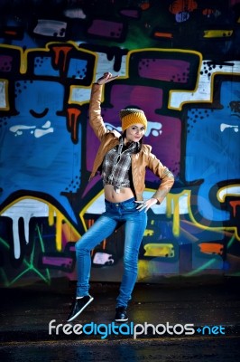 Pretty Young Girl And Graffiti Stock Photo