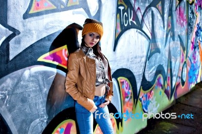 Pretty Young Girl And Graffiti Stock Photo