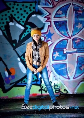 Pretty Young Girl And Graffiti Stock Photo