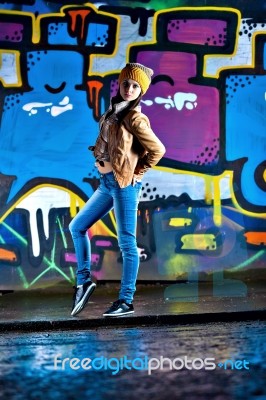 Pretty Young Girl And Graffiti Stock Photo