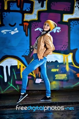 Pretty Young Girl And Graffiti Stock Photo