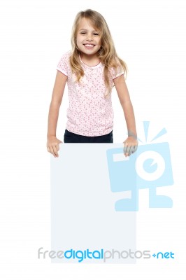 Pretty Young Girl Showcasing Blank Whiteboard Stock Photo