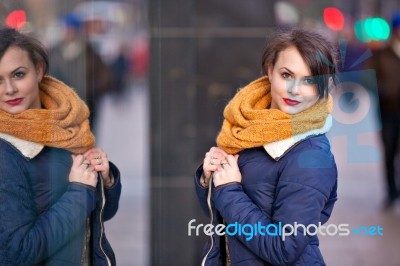 Pretty Young Girl Standing At Shopfront Stock Photo