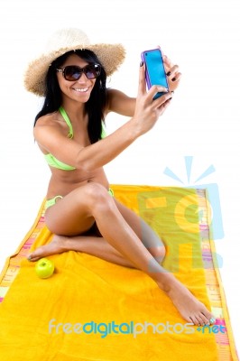 Pretty Young Girl With Green Bikini Taking Selfies With Her Smar… Stock Photo