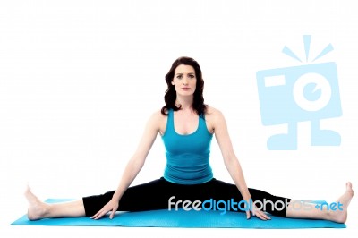 Pretty Young Woman Doing Stretching Exercises Stock Photo