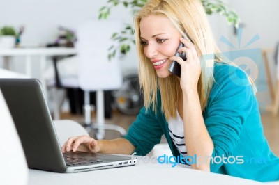 Pretty Young Woman Working With Laptop At Home Stock Photo