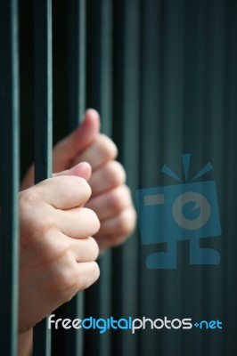 Prisoner In Jail Stock Photo