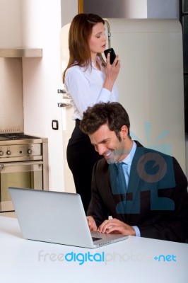 Professional Couple Working From Home Stock Photo