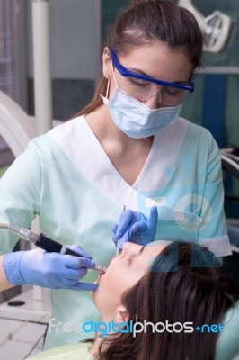 Professional Dental Brushing Stock Photo