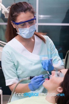 Professional Dental Brushing Stock Photo