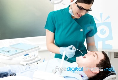 Professional Dentist Doing Dental Checkup Stock Photo