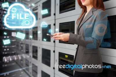 Programmer In Data Center Room Stock Photo