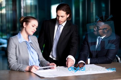 Project Leader Giving Out Guidelines To His Team Stock Photo