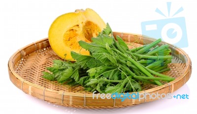 Pumpkin And Leaf  On Wicker Tray Isolated Stock Photo