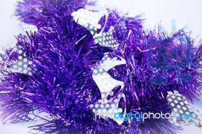 Purple Holiday Decoration Ribbon On White Background Stock Photo