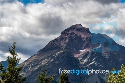 Purple Mountain Next To Lower Two Medicine Lake Stock Photo