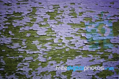 Purple Peeling Painted On Wooden Wall Stock Photo