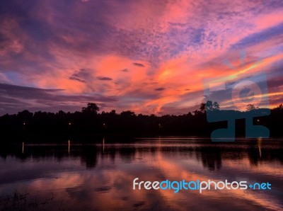 Purple Sky Sea Reflection Stock Photo