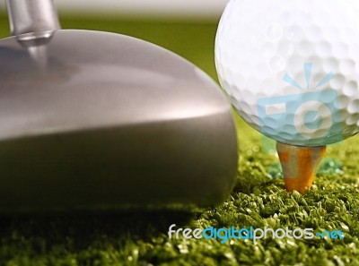 Putting A Golf Ball Stock Photo