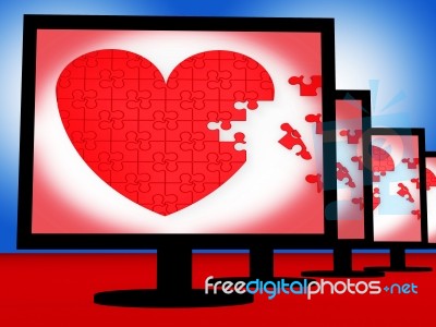 Puzzle Heart On Monitors Shows Love Stock Image