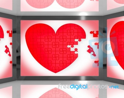 Puzzle Heart On Screen Showing Romantic Movies And Soap Operas Stock Image