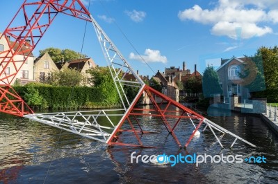 Pylon In The Canal In Bruges West Flanders Belgium Stock Photo