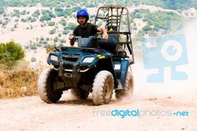 Quad Bike Racer Stock Photo