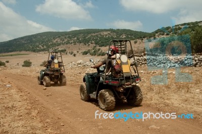 Quad Motorcycle Racing Stock Photo